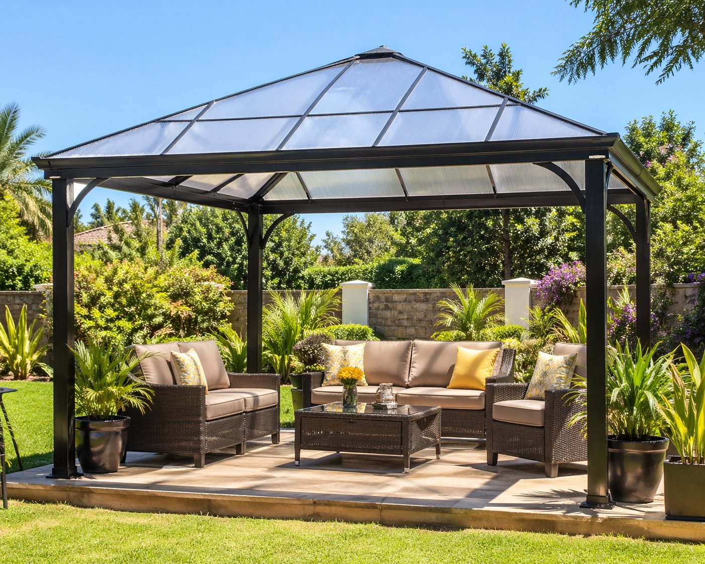 Steel-frame hardtop gazebo with polycarbonate roof panels and wicker lounge furniture in a landscaped garden — popular modern gazebo Kenya
