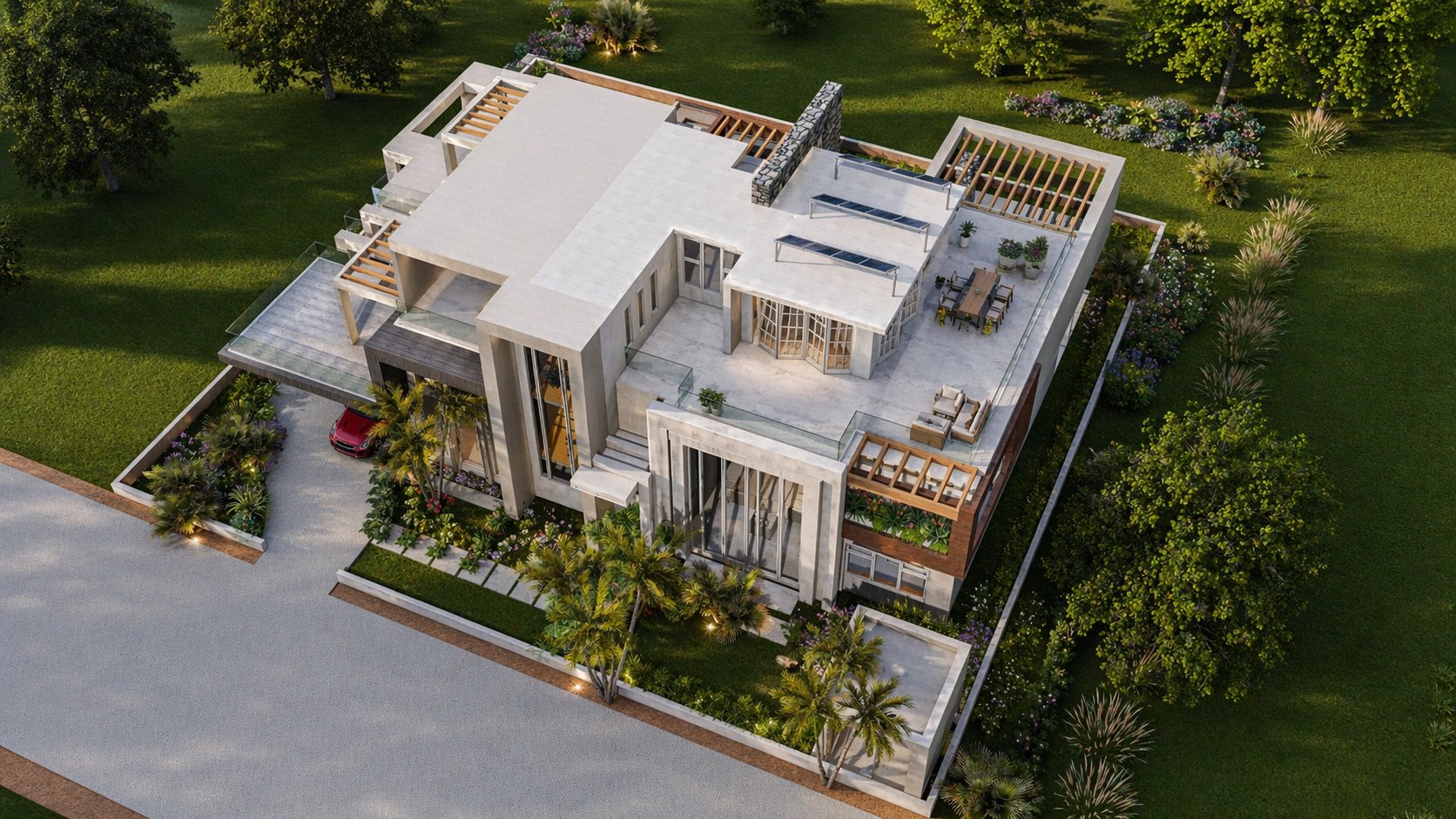 Evening aerial of Aalis Studios luxury Kenyan mansion — rooftop terraces illuminated at dusk with garden lighting and mature trees