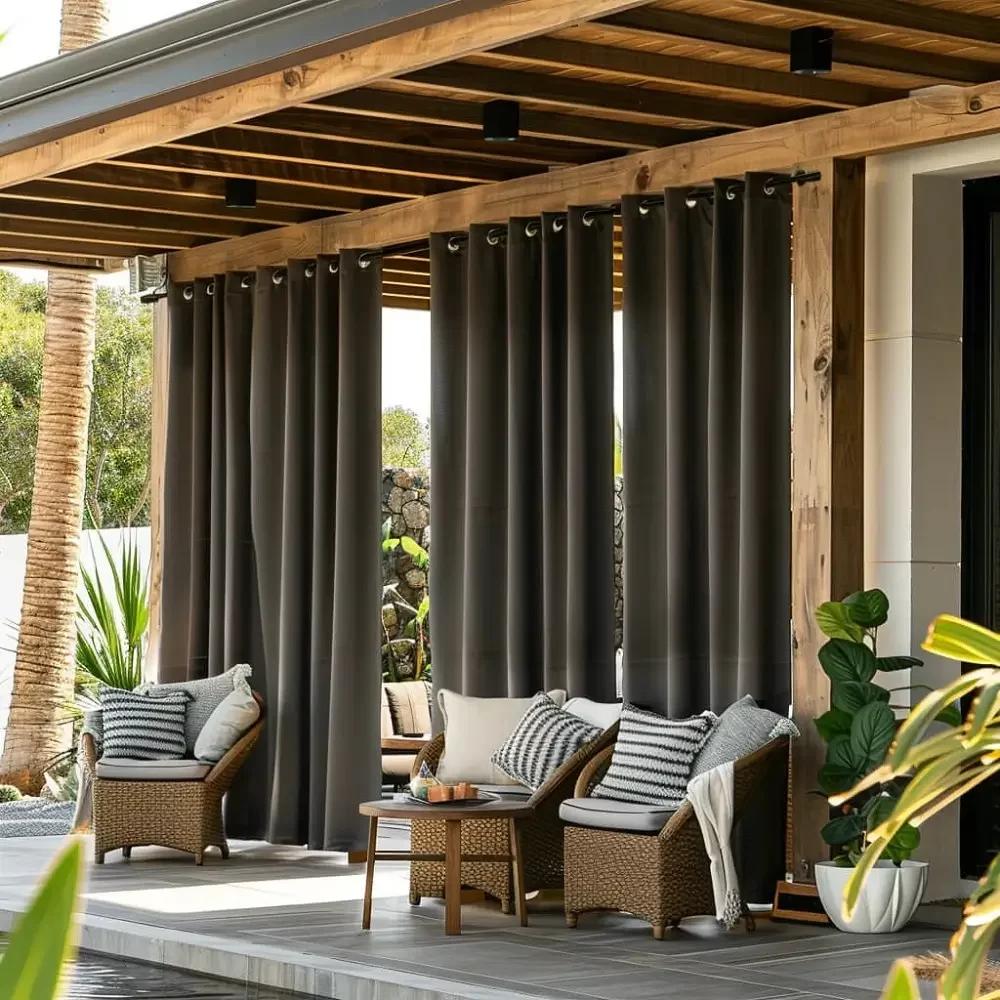 Attached timber pergola with grey outdoor curtain panels and rattan lounge chairs — modern patio pergola design for Nairobi Kenya home