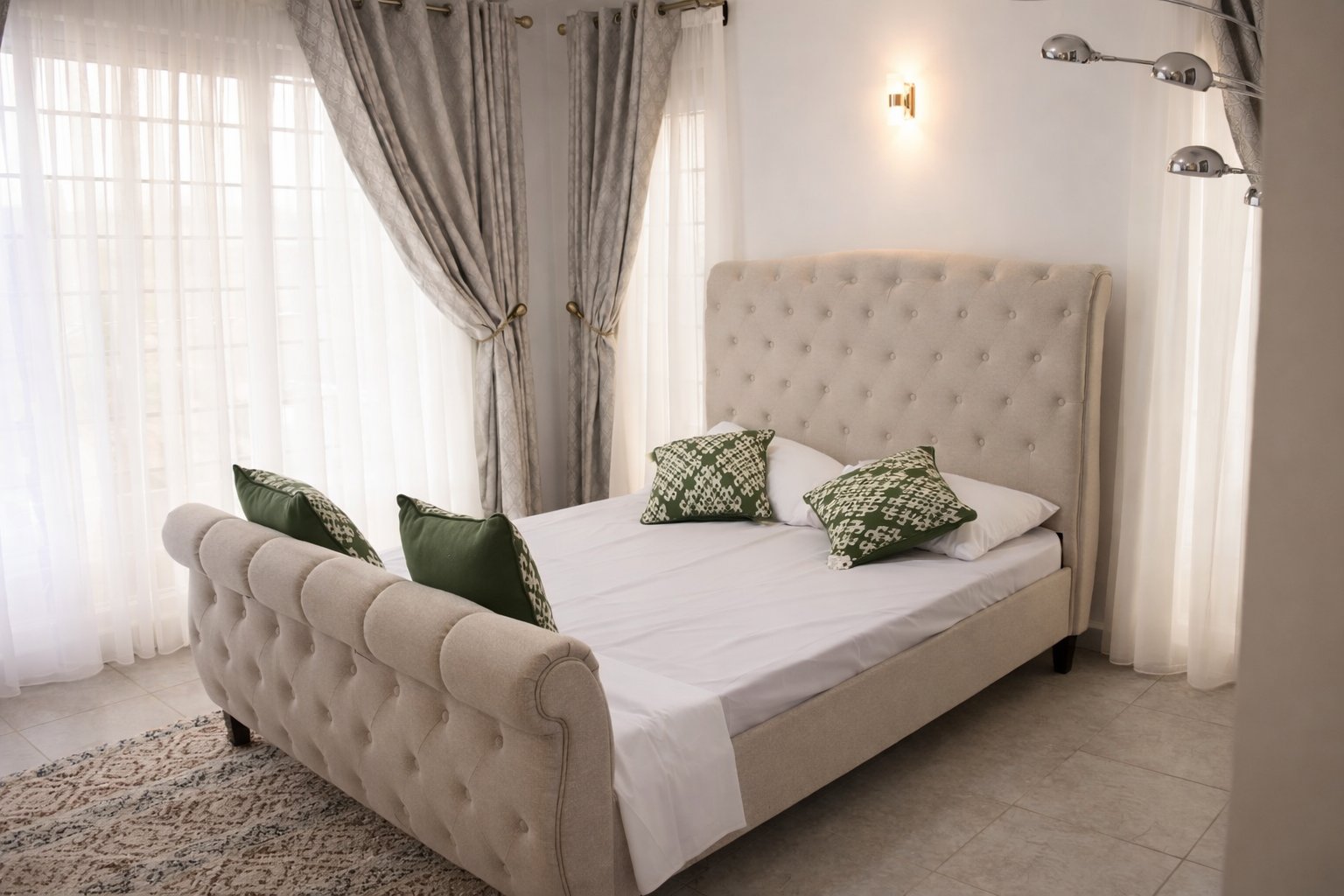 Master bedroom with natural light and ensuite bathroom in Twinfalls City 3-bedroom bungalow, Malaa